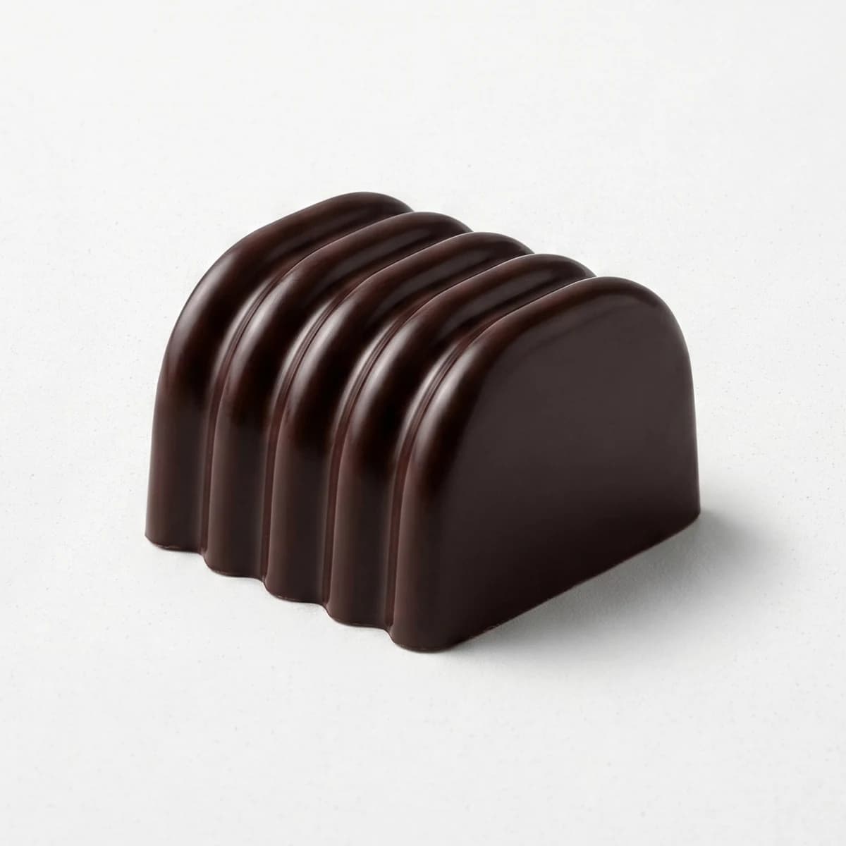 Bombón de Sambayón en chocolate amargo