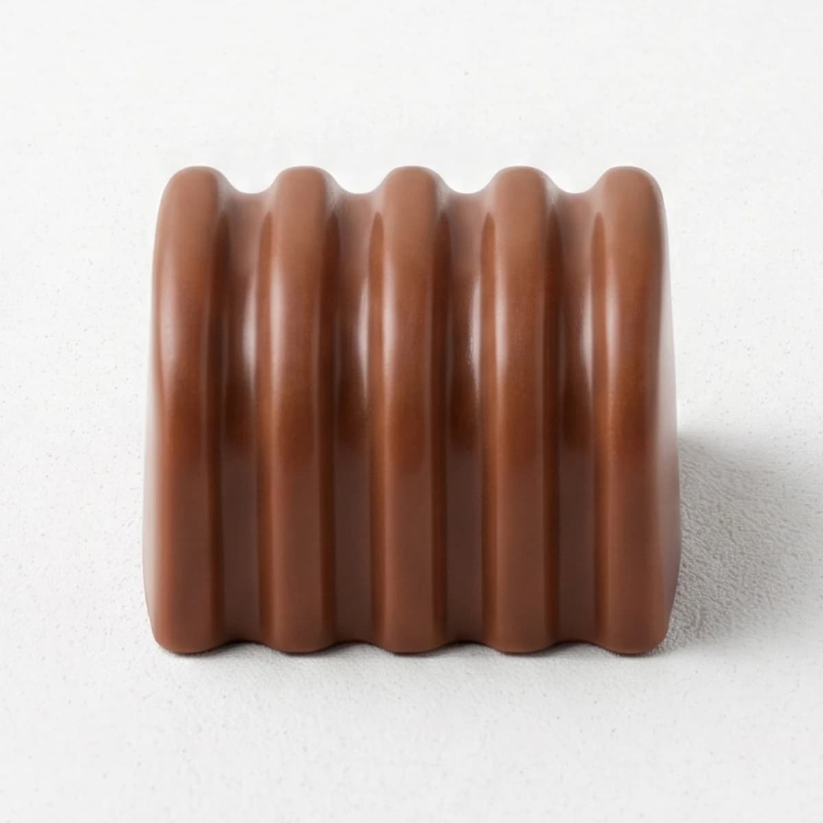 Bombón de Sambayón en chocolate con leche