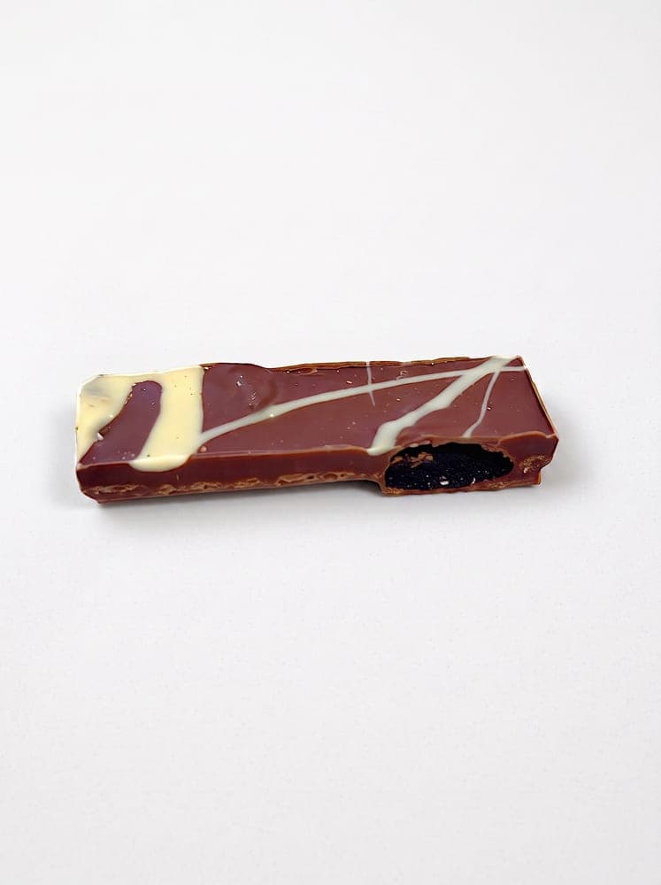Ciruela · Chocolate con leche y blanco